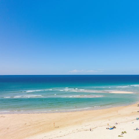 Stroll along the soft sands of Hayle Beach, just footsteps from your home