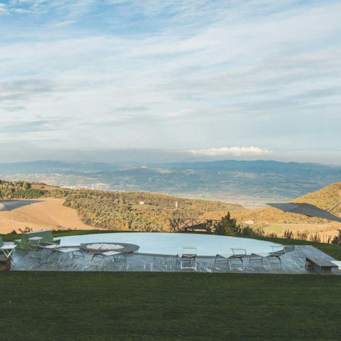 Swim in the private pool with views across the Umbrian hills