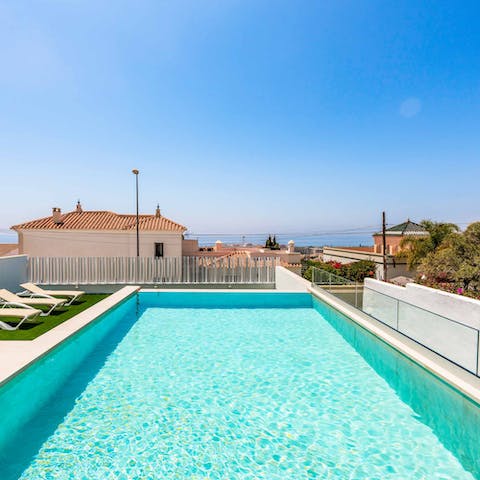 Swim laps in the crystal-clear pool to cool off in the southern Spanish sun