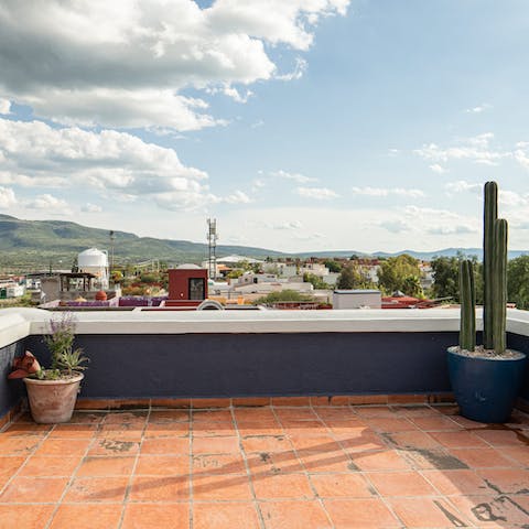 Enjoy expansive views across the city from the roof terrace