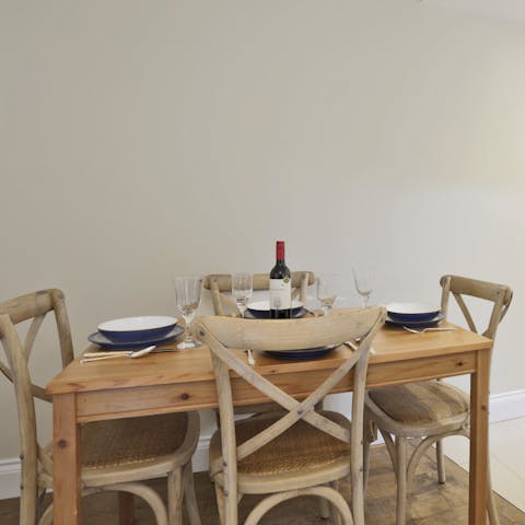 Set the wooden dining table for a meal all together