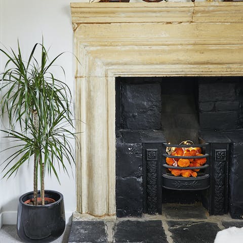 Light up the original stone fireplace for a cosy night in