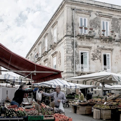 Buy fresh produce from the Ortigia Market right outside your door