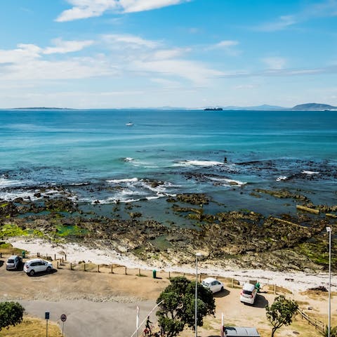 Go for a stroll on Mouille Point Beach, just footsteps from this home