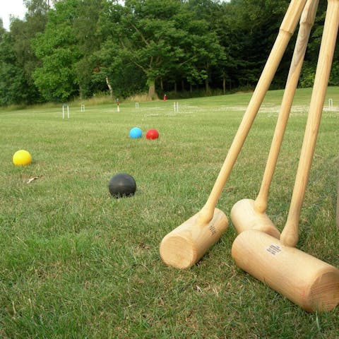 Try and beat your partner at a round of croquet