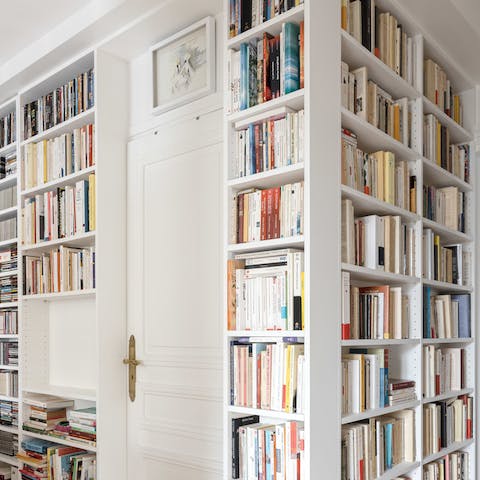 Curl up with a book from the hallway's charming built-in library
