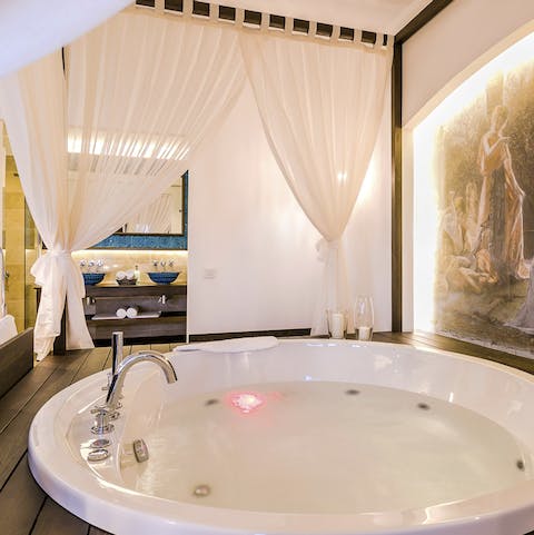 Sink into the bubbles of the jacuzzi bath