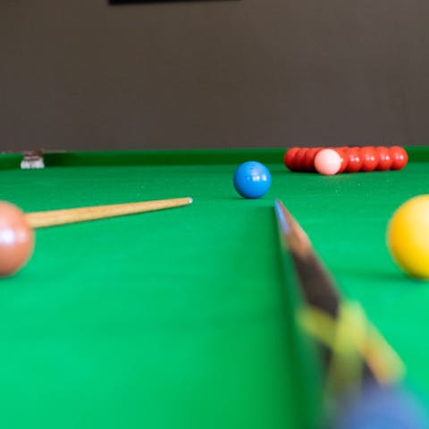 Show off your potting skills on the snooker table