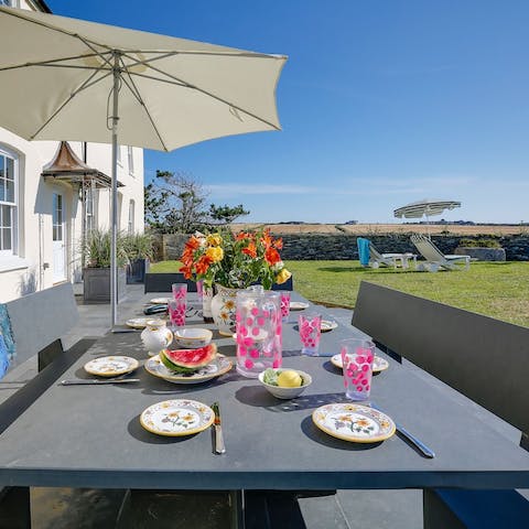 Tuck into Cornish cream tea in the garden