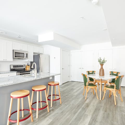 Sip a glass of wine at the sociable breakfast bar as you wait for supper to cook