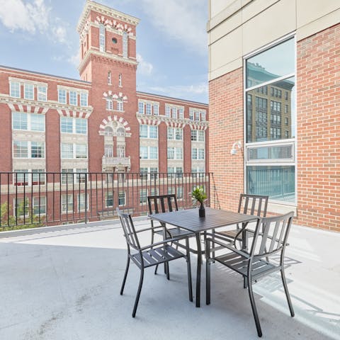 Eat outdoors on the private balcony, nestled between the Victorian brownstone buildings
