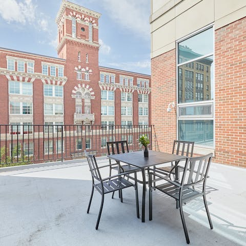 Eat outdoors on the private balcony, nestled between the Victorian brownstone buildings