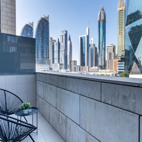Gaze out at the breathtaking cityscape from your own balcony 