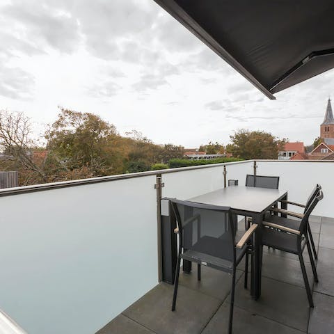 Sit out on the balcony and dine alfresco with views over the neighbourhood