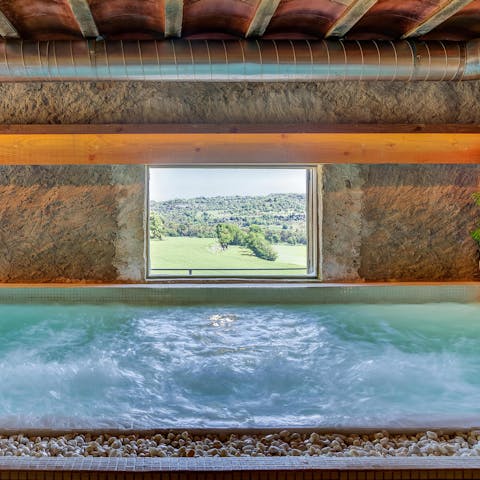 Gaze out from the windows of your private spa