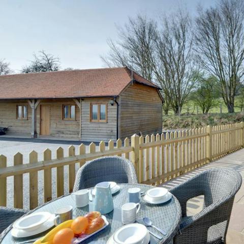 Enjoy breakfast out in the sunshine on the private patio