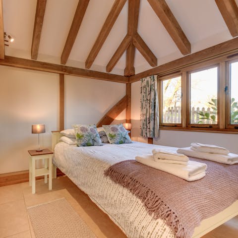 Fall asleep under vaulted ceilings in the handmade bespoke beds