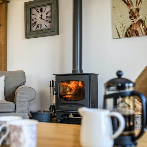 Put another log on the toasty fire and snuggle up in the cosy living area