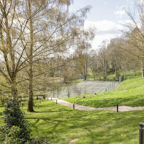 Explore the 6 acres of parkland surrounding this home – will you play tennis?