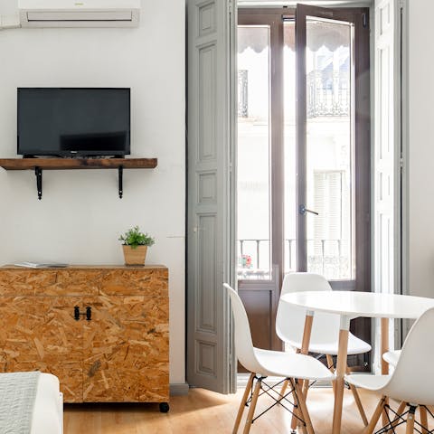 Open up the French doors to create Juliet balconies looking out over the street