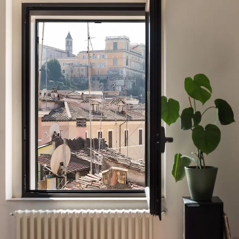 Take in the views over Trastevere