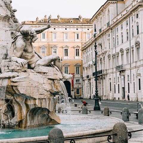 Explore beautiful Piazza Navona, a fourteen-minute stroll away 