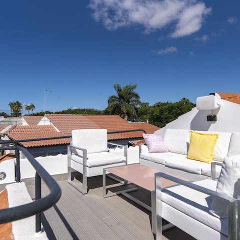 Head up to the private rooftop terrace for a view over the rooftops to the palms