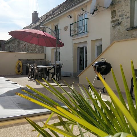 Enjoy a barbecued dinner alfresco on your sand-blasted terrace