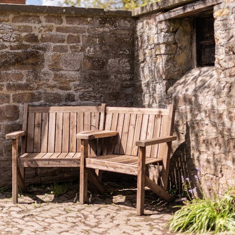 Find a quiet moment for a cup of tea in the courtyard