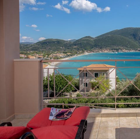 Sit back with a glass of Grecian wine and admire the sea views