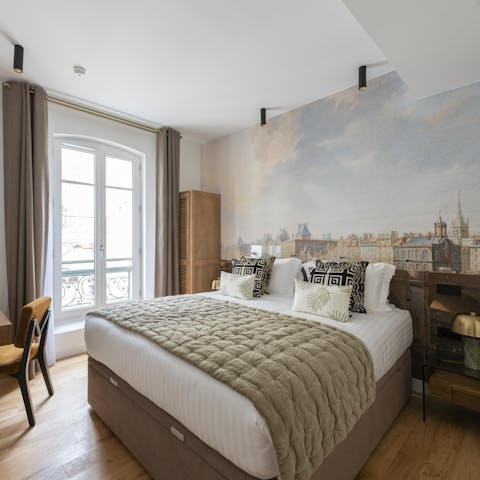 Wake up in the Paris-themed bedroom before opening up the French doors for Juliet balcony views of the city