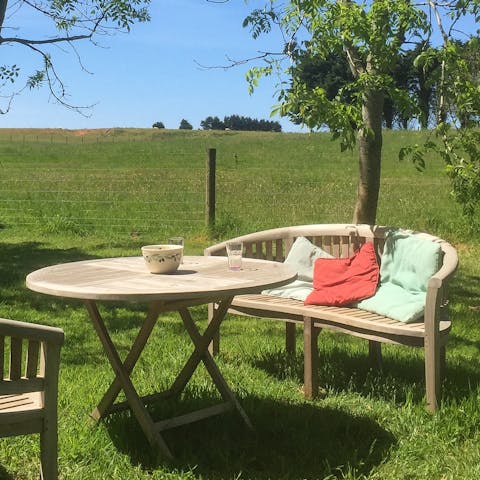 Sip your Earl Grey in the lush gardens of the farm as you listen to the birds sing