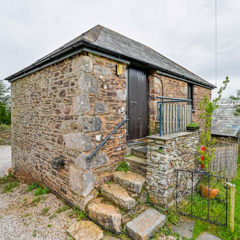 Climb the ancient, stone steps of the rustic farm building that you can call home