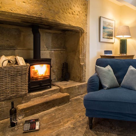 Curl up with a good book in front of the inglenook fireplace
