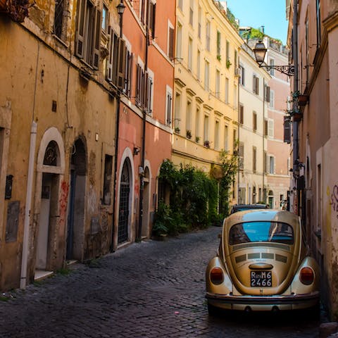 Explore Rome's colourful Trastevere neighbourhood, a twenty-minute walk away