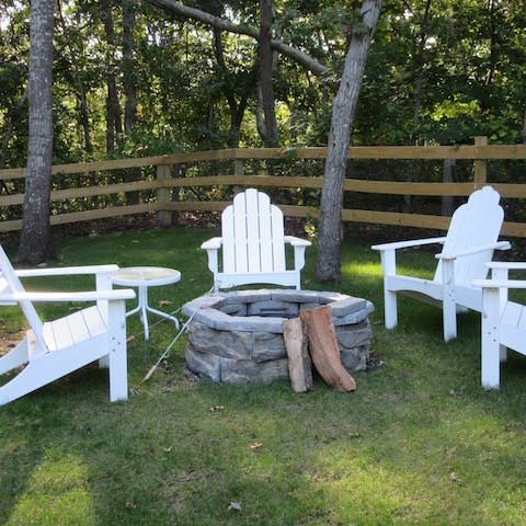 Toast marshmallows and relax by the fire pit