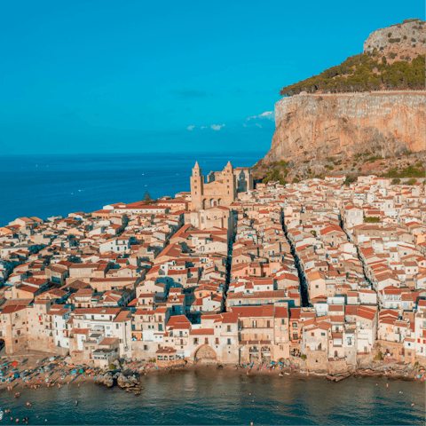 Visit the coastal town of Cefalù, with its 12th century Norman Cathedral