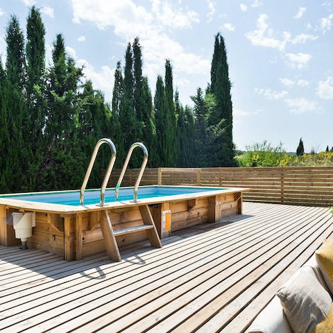 Take a swim in the private pool set amidst a huge garden 