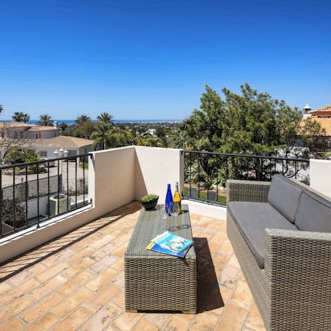 Soak up the clear skies and sea views from the rooftop terrace