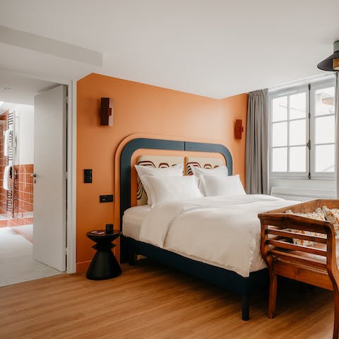 Wake up in your stylish bedroom feeling rested and ready to explore the city