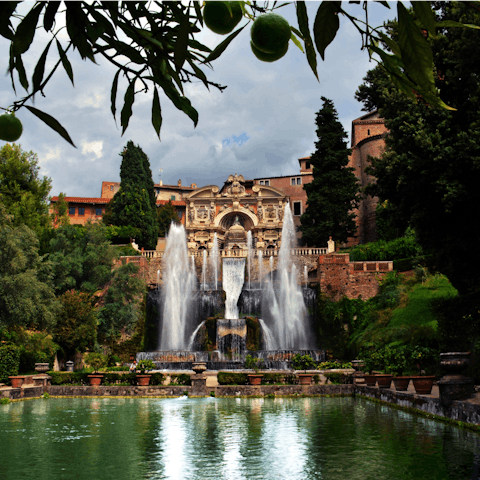 Visit the majestic palace and gardens at Villa d'Este, one-minute away on foot