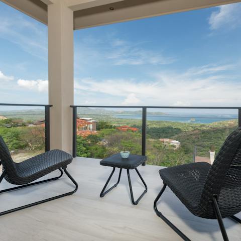 Take your sundowner on the master bedroom's private balcony