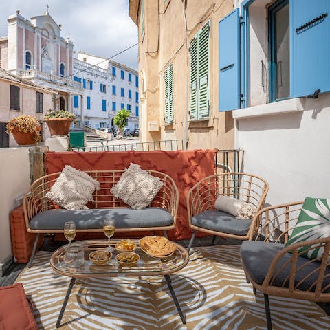 Serve up a French aperitif of local wine and olives on the terrace