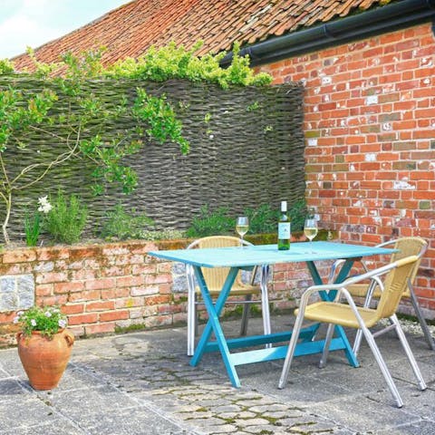 Dine alfresco on your private patio among the sights and sounds of rural Suffolk