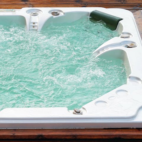 Enjoy a long soak in the hot tub on the terrace