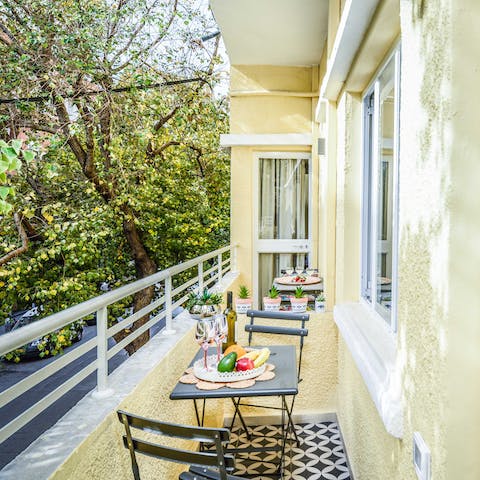 Enjoy your morning coffee out on your cute terrace, overlooking the leafy street below