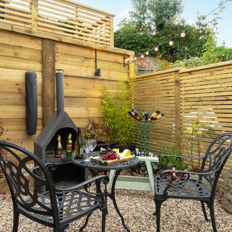 Enjoy romantic alfresco suppers in the magical garden