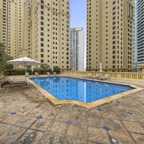 Spend hot afternoons dipping in and out of the communal pool