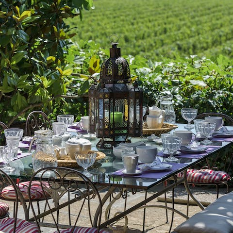 Dine in the sunshine overlooking the rolling vineyards