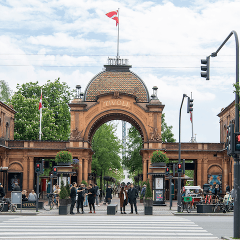 Explore Tivoli Gardens with its rides, gardens and restaurants, a five-minute walk away